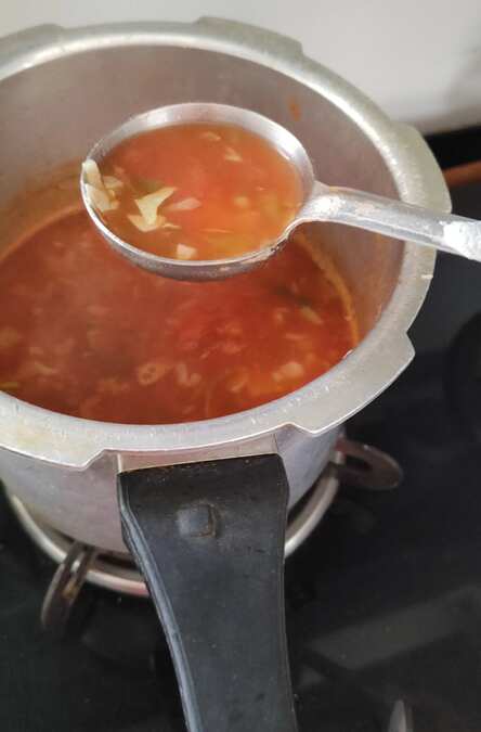 Vegetable tomato soup in cooker