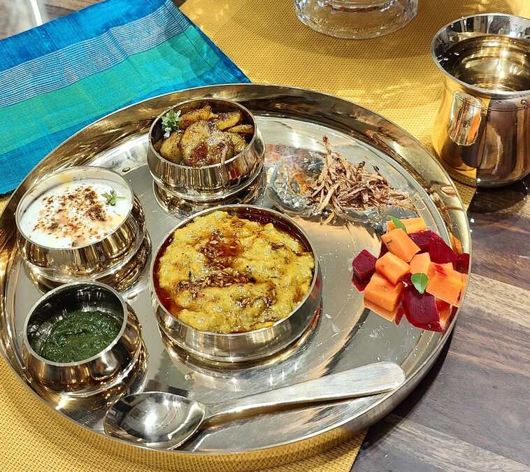 Bajre ki khichdi with dahi,dhania pudina chutney,shakarkandi roasted ,fried ginger and carrot n beet