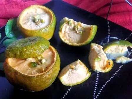 How to make Orange Kulfi In Orange Shells Recipe
