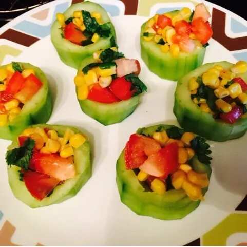 Cucumber cup filled with corn salad