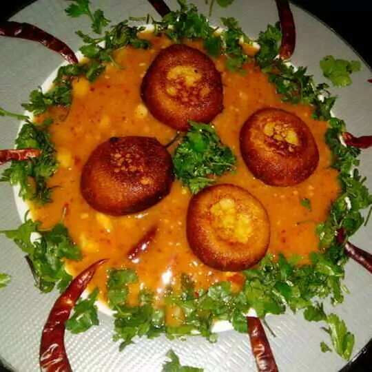 Gulab jamun in hot red thai sauce