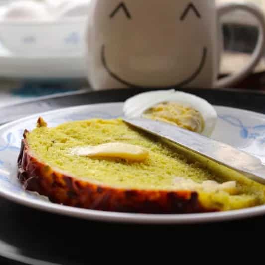 How to make Masala Cheese Loaf (bread With An Indianised Version Of Garam Masala And Herbs Sprinkled Over With Cheese) Recipe