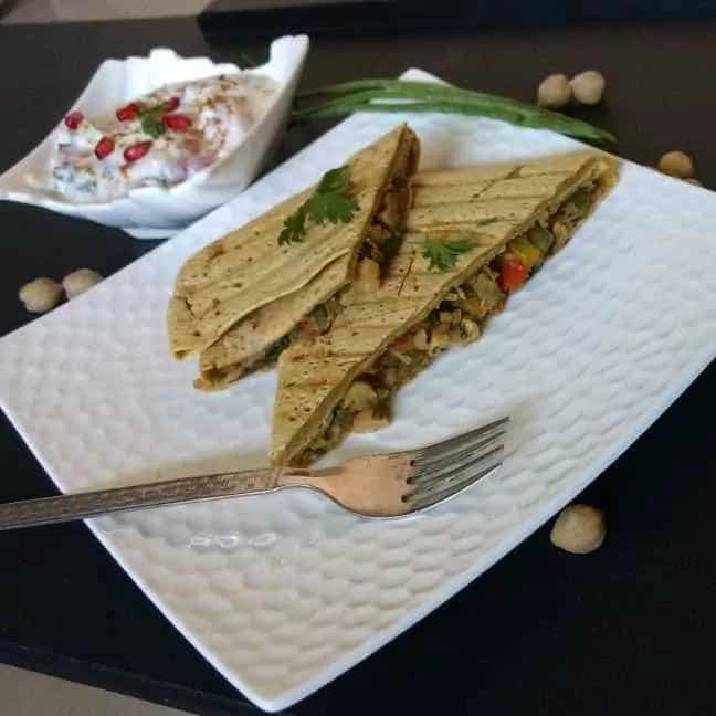 How to make Stuffed Grilled Besan Chilla With Curd Raita Recipe