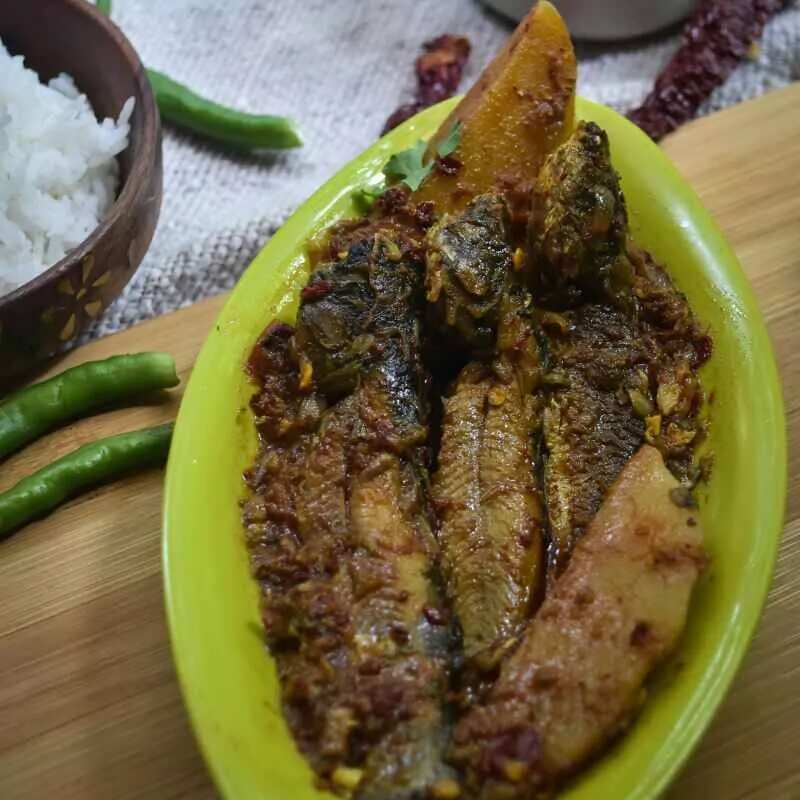 How to make Tangra Macher Tel Jhaal Recipe