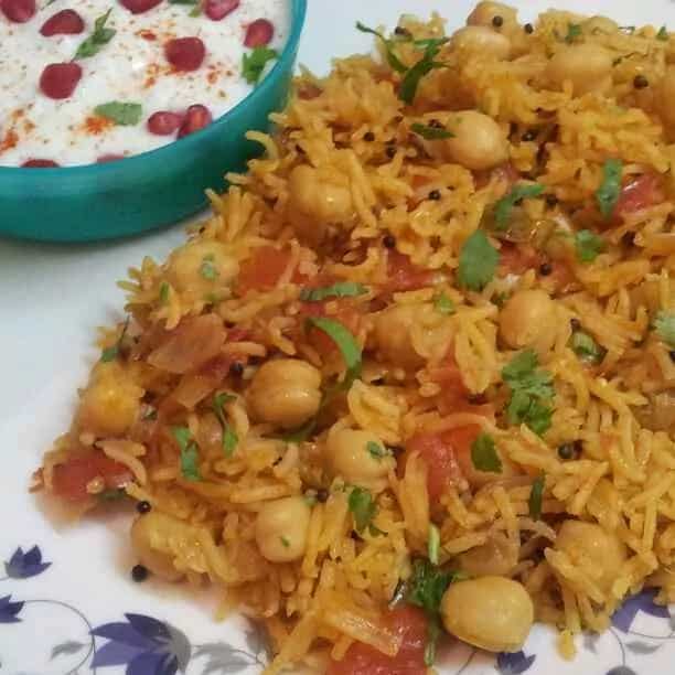 How to make Tomato Rice With Chickpeas Recipe