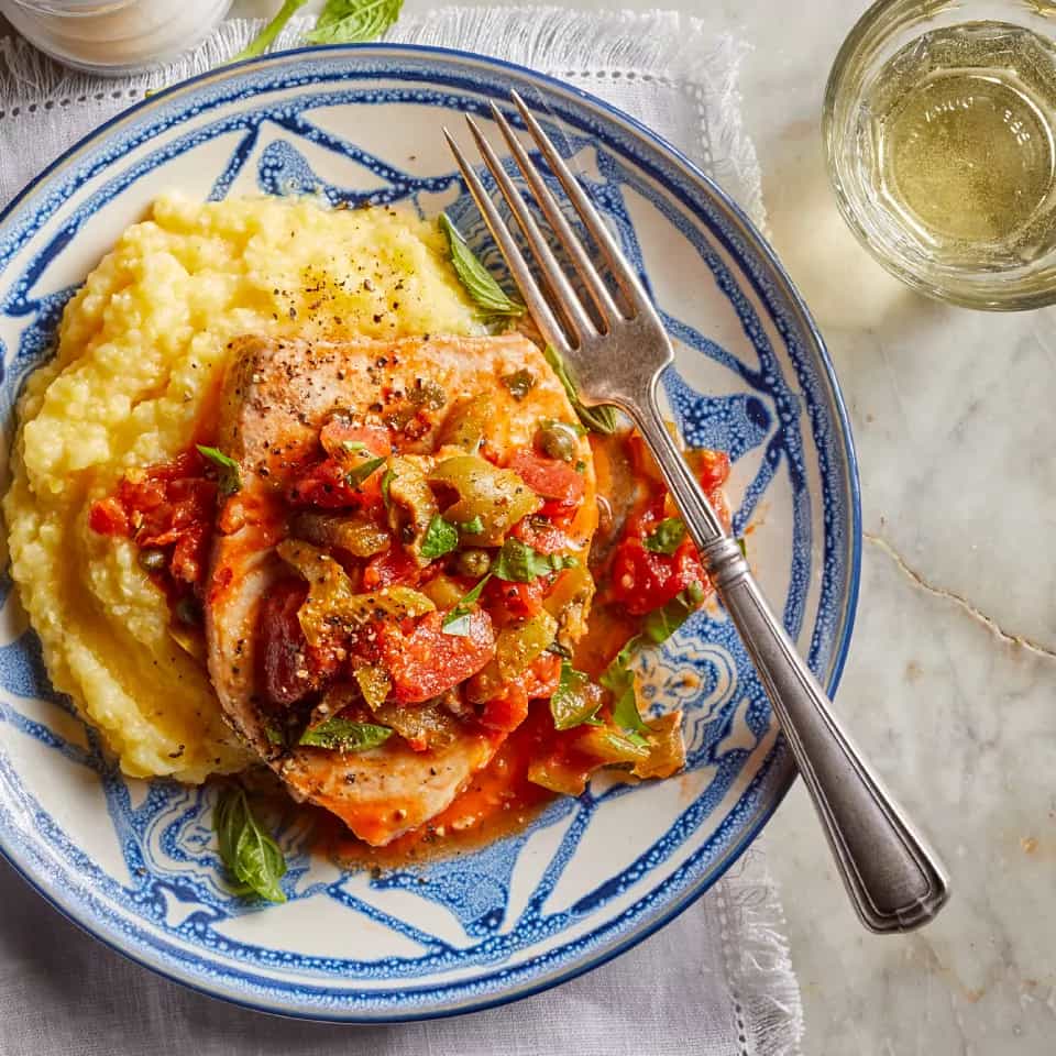 How to make Swordfish With Olives Capers & Tomatoes Over Polenta Recipe