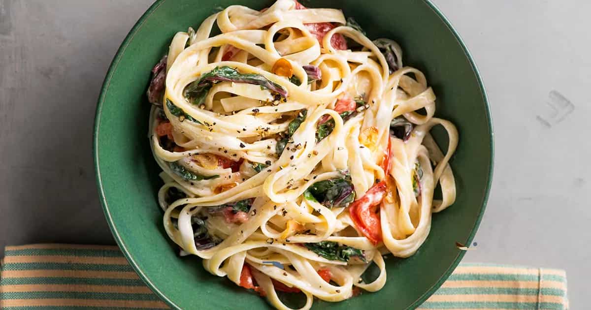 How To Make Creamy Vegan Pasta With Swiss Chard And Tomatoes Recipe