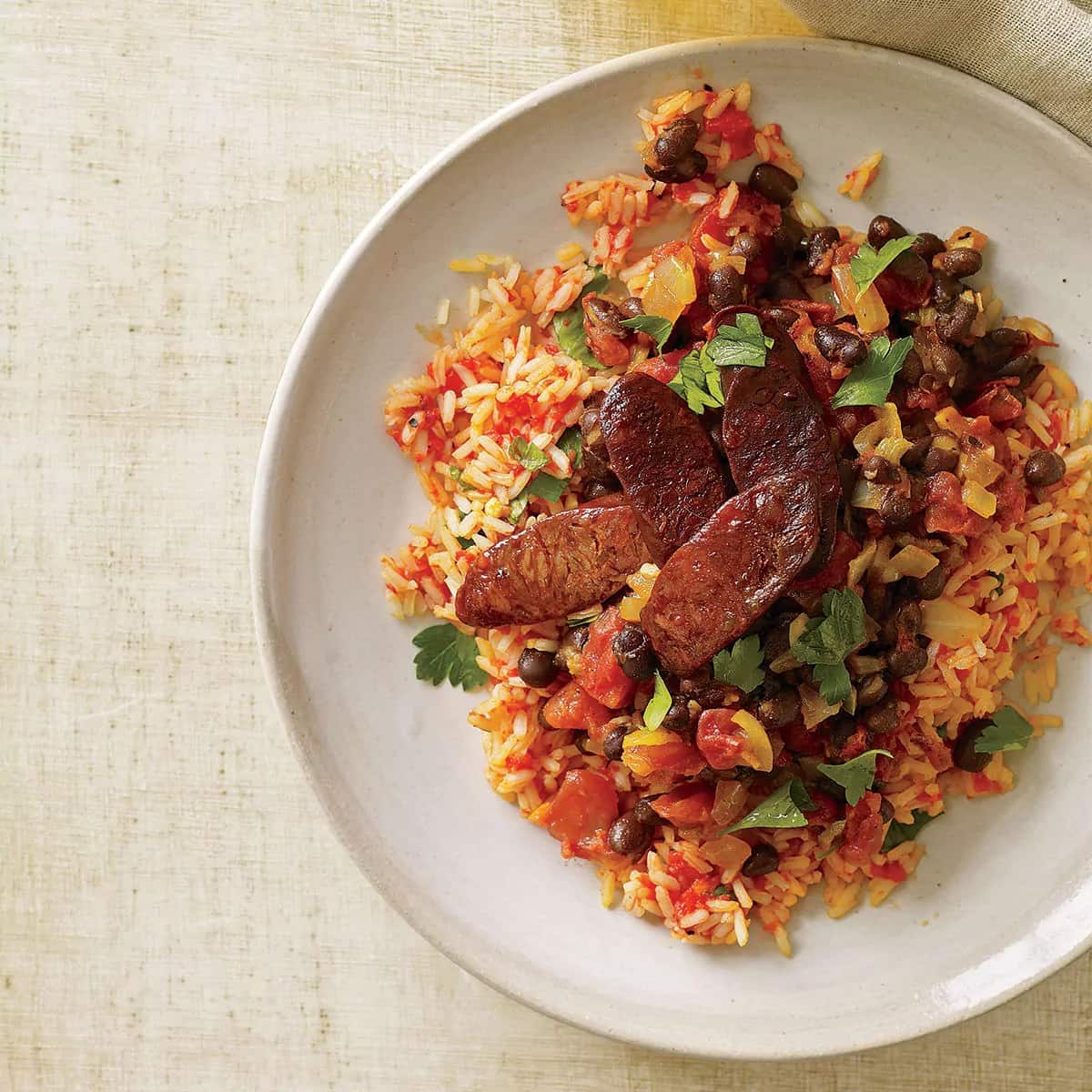 How to make Smoky Red Rice And Chorizo With Black Beans Recipe