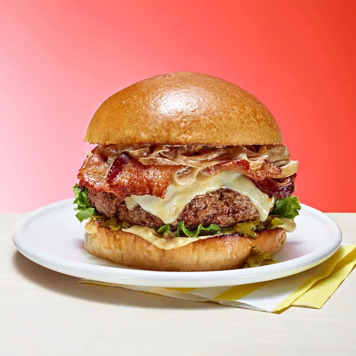 How to make Two-cheese Bacon Burger With Creamy Caramelized Onion Sauce Recipe
