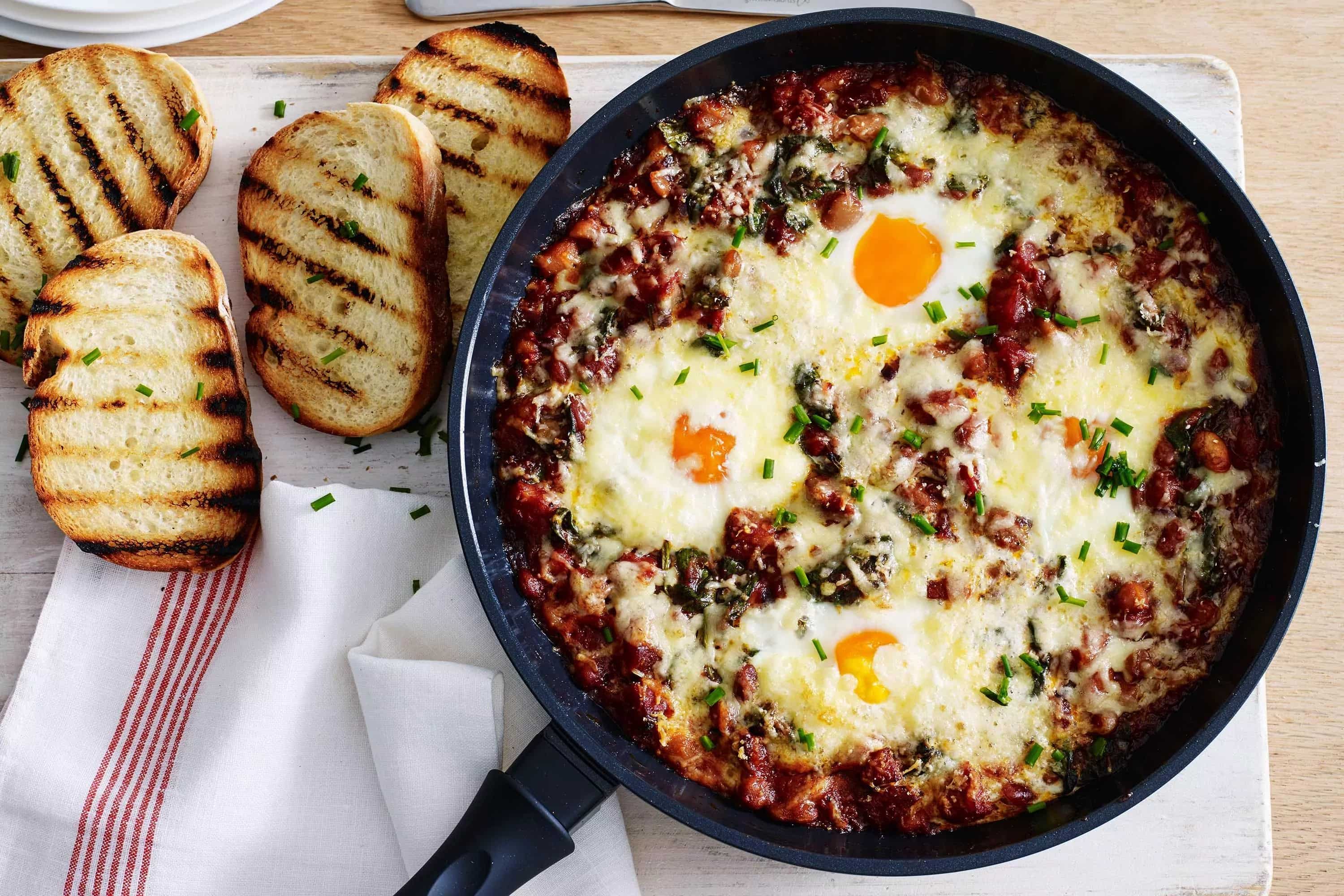 How to make Cheesy Baked Eggs With Tomato And Chorizo Recipe