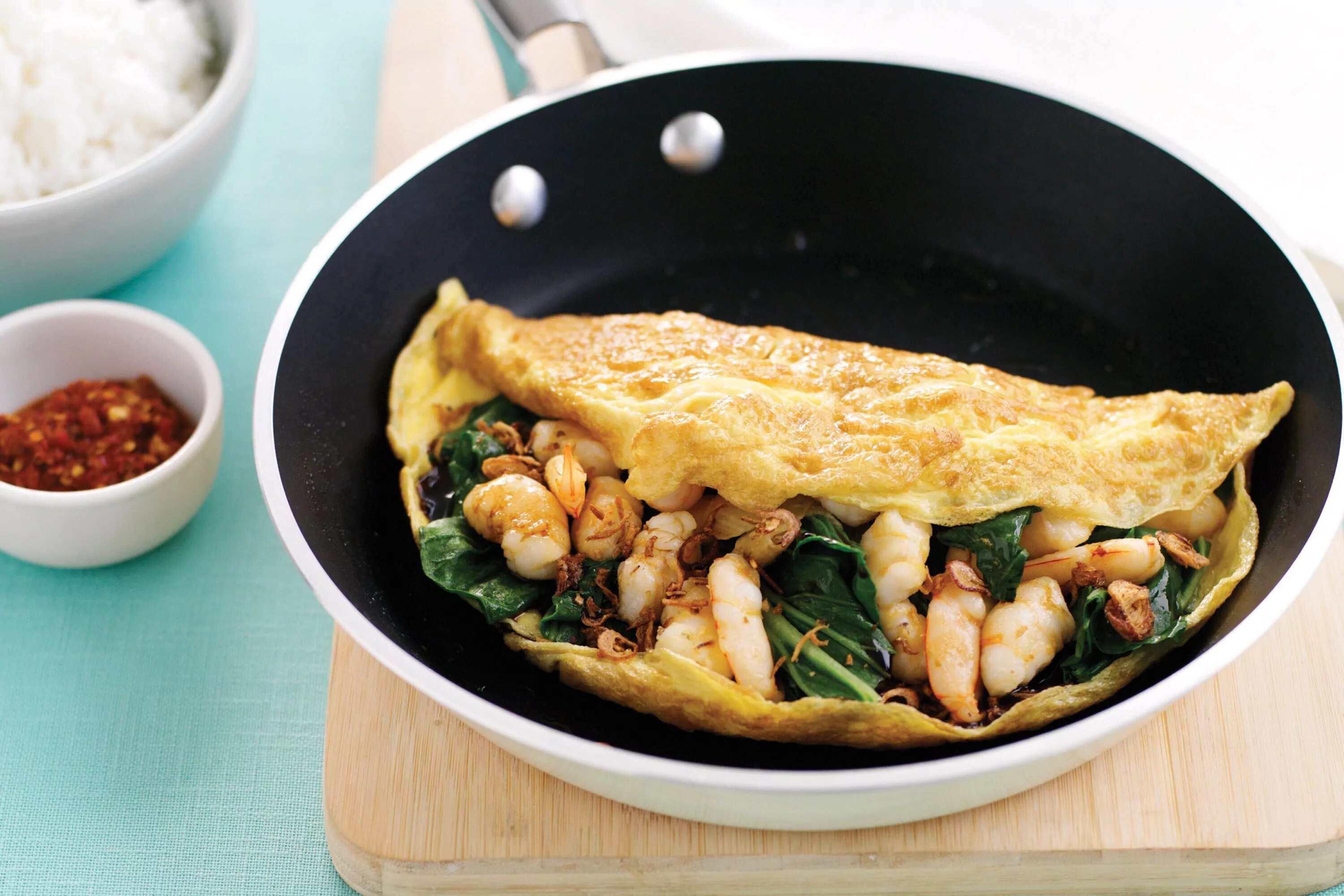 How to make Omelette With Garlic Prawns And Choy Sum Recipe