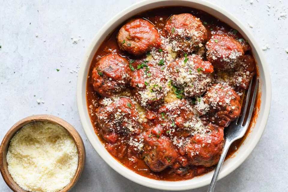 How to make Pork And Onion Meatballs With Tomato Sauce Recipe