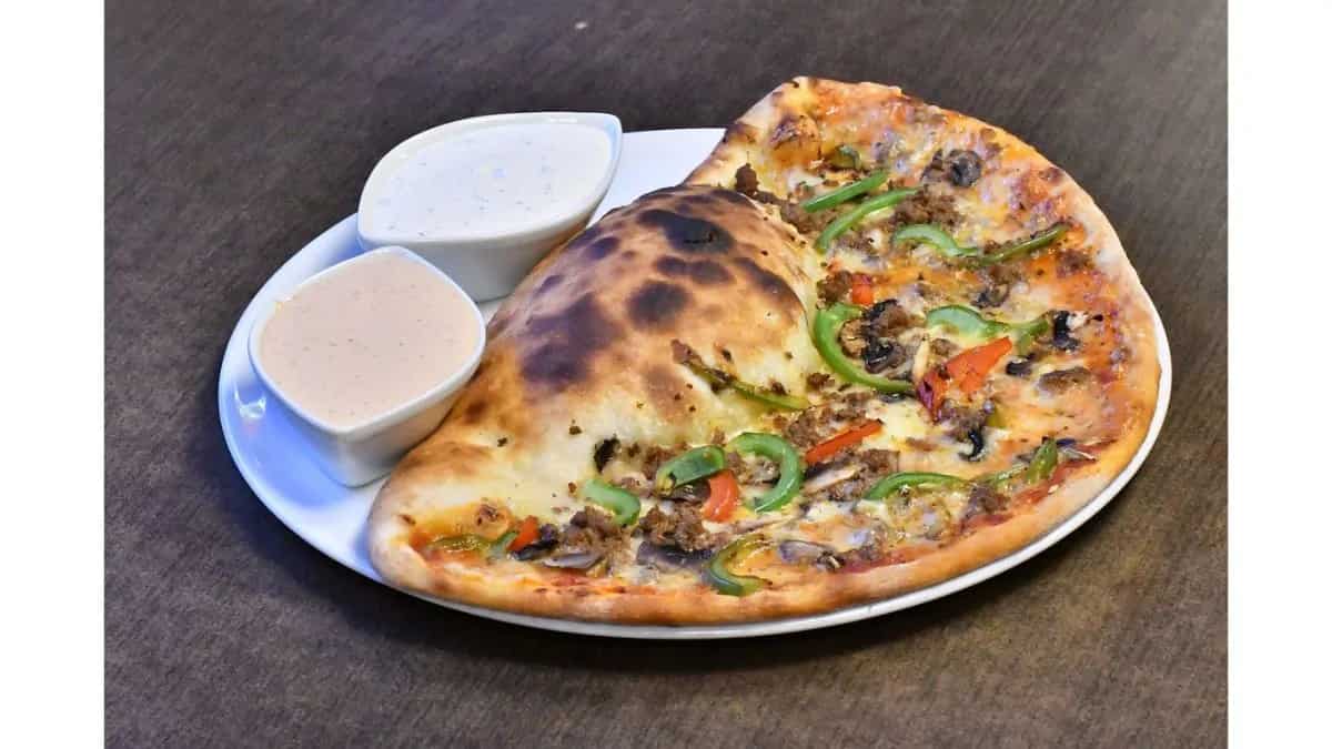 Neapolitan Calzone An Italian Folded Pizza Treat That The Spot