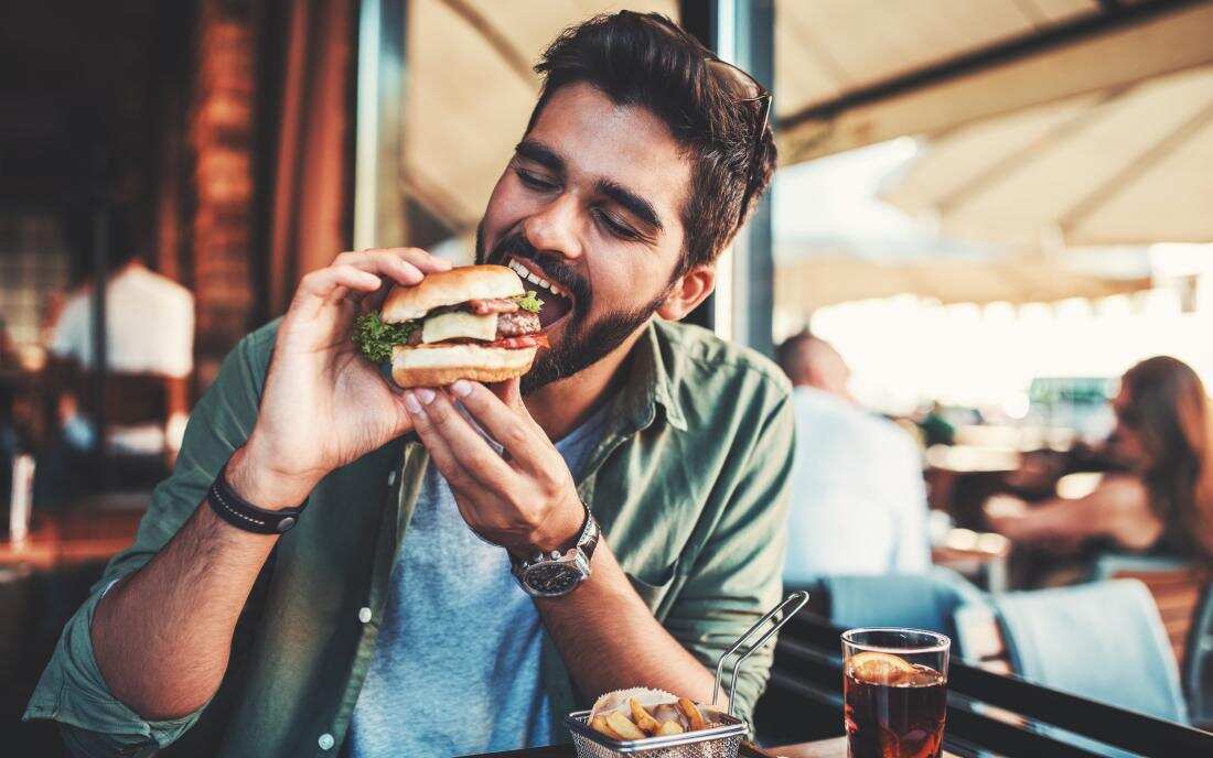 man-eating-a-burger